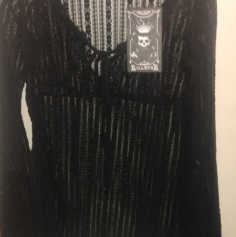 Bell sleeved top
